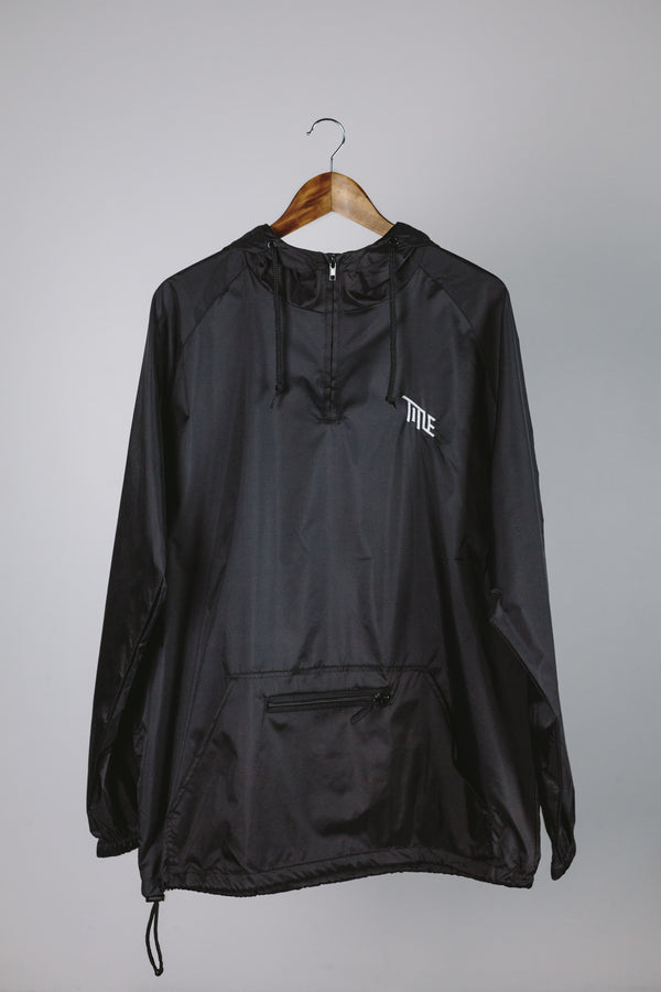 Black windbreaker water resistant jacket with white Title logo mountain bike shell. 