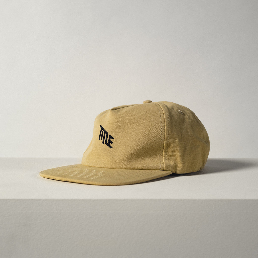Unstructured Hat - Yellow with Black Title MTB logo shown on white background 