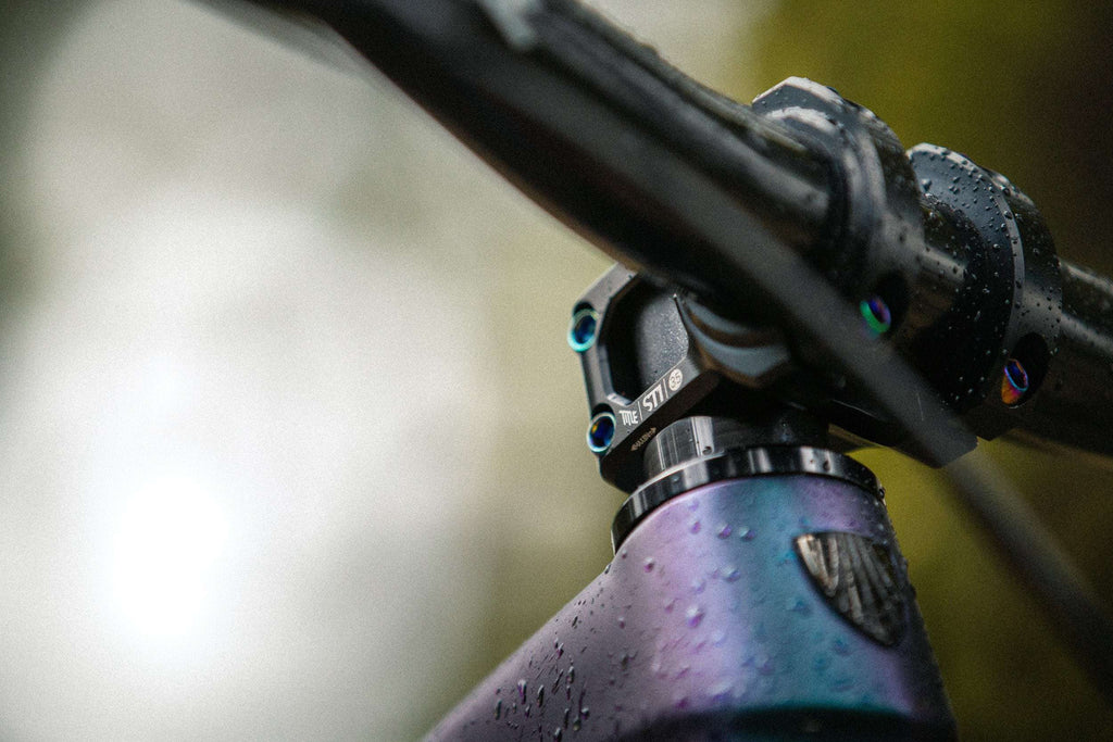 ST1 35mm clamp - Title MTB oil slick rainbow bolts mounted on bike Casey Brown